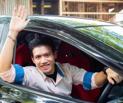 handsome-young-man-black-car_1150-14287