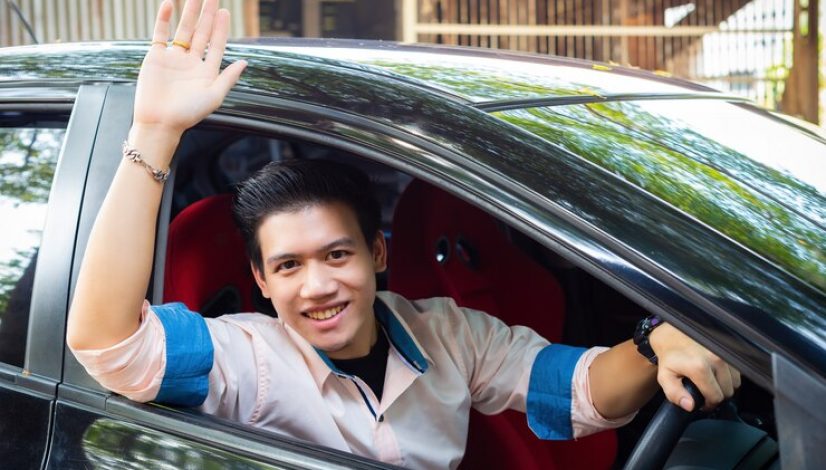 handsome-young-man-black-car_1150-14287