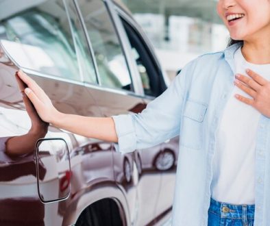 happy-woman-car-dealership_23-2148130238